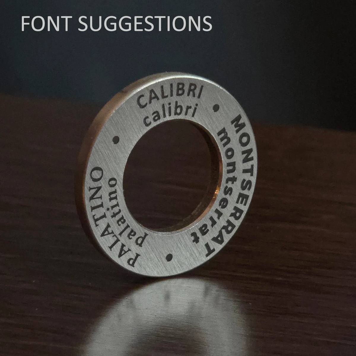 Font options for the engraved brass dog tag: Calibri, Montserrat, Palatino and more
